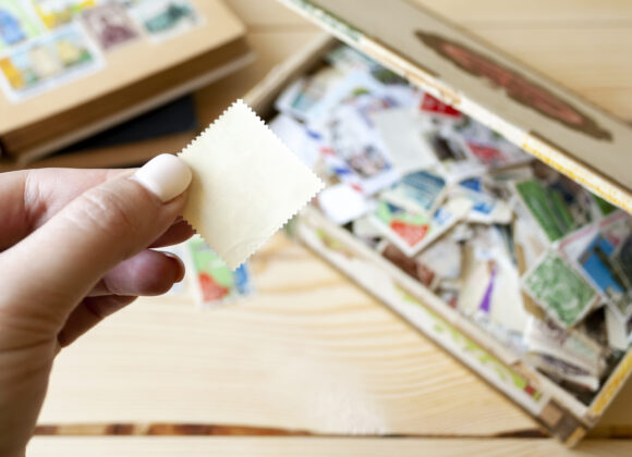 Cut Out for God hand-holds-a-blank-postage-stamp-2026-01-07-23-56-33-utc