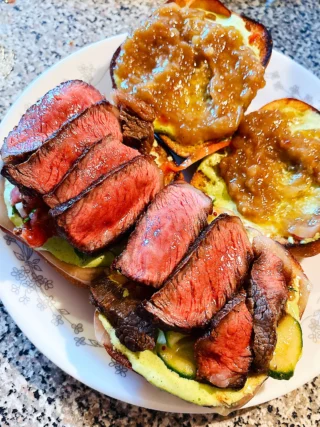 A steak sandwich done right hits that perfect balance—savory, fresh, and a little unexpected.

Tender steak piled onto toasted ciabatta, layered with sweet caramelized onions, crisp cucumbers, and juicy tomatoes, then finished with a bright cilantro garlic ginger sauce that ties it all together.

It’s hearty, messy in the best way, and honestly hard to stop thinking about after the last bite.

#SteakSandwich #CiabattaBread #HomemadeEats #FoodieFavorites #SandwichLovers